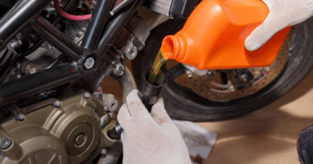 Checking engine oil level and motorcycle essentials before starting a long ride