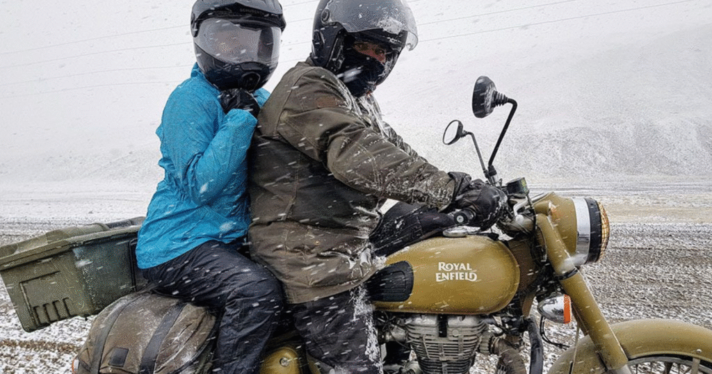 Rider and pillion enjoying a Bullet motorcycle ride symbolizing passion for biking