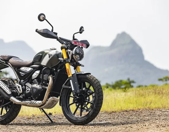 Triumph Scrambler 400X side profile showcasing design changes