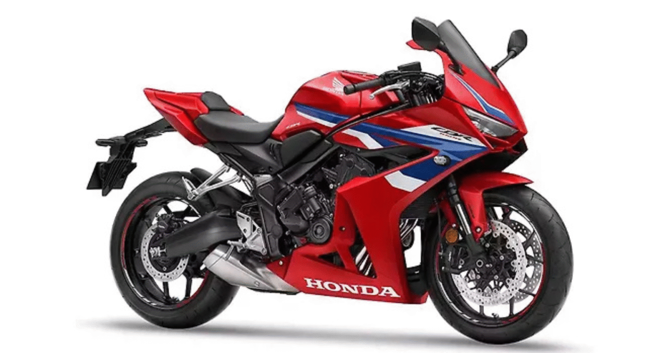 2025 Honda CBR650R side view showing red color variant and new exhaust design