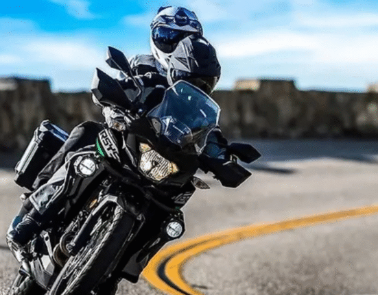 Kawasaki Versys X 300 front view with windscreen and wire-spoke wheels