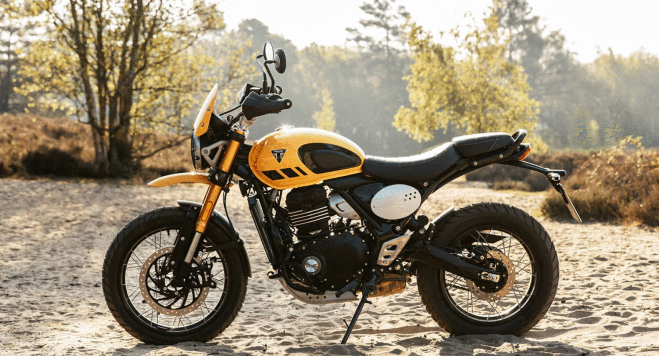 Triumph Scrambler 400 XC side profile showcasing wire-spoke wheels and raised suspension