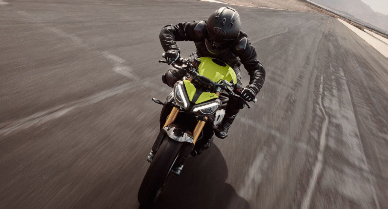 Front view of Triumph Speed Triple 1200 RX with carbon fibre accents and RX branding