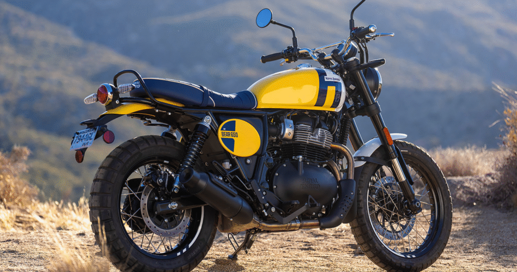 Royal Enfield Bear 650 scrambler motorcycle parked on a rugged trail, showcasing its off-road capabilities and upright stance.