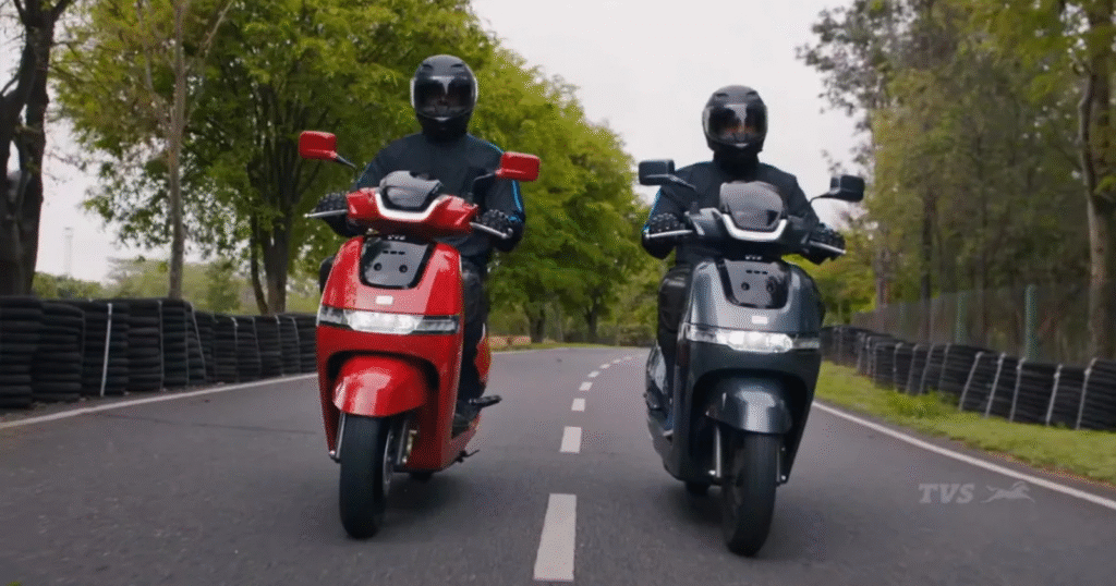 tvs iqube st new update riding in city street