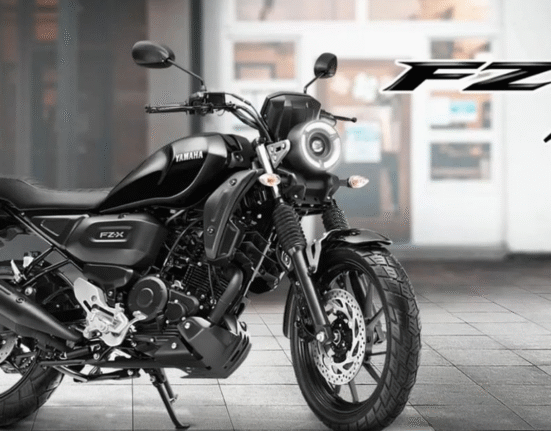 Yamaha FZ X Hybrid parked on side stand in black color