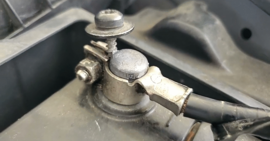 Loose motorcycle battery terminals causing electrical issues