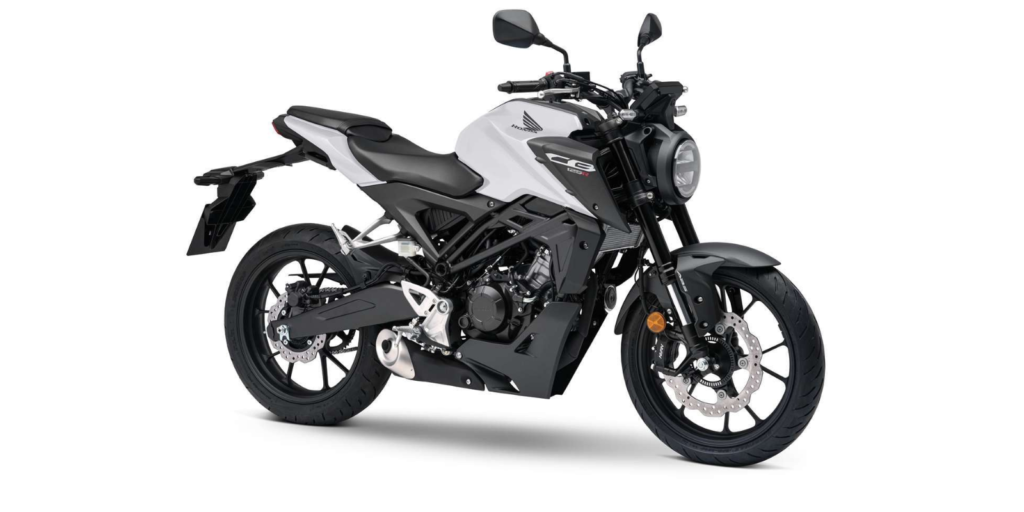 Side view of the Honda CB125R in Matt Rock Gray Colour highlighting the round LED headlamp and sculpted tank design