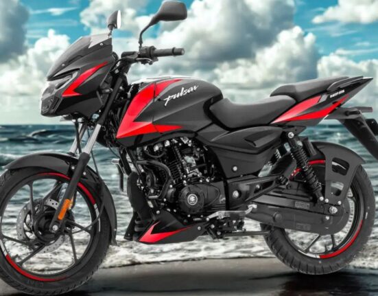 2026 Bajaj Pulsar 125 in black and red colour photographed against a coastal background