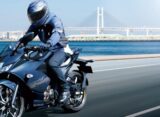 Rider riding the 2026 Suzuki Gixxer SF 250 on an open road showcasing the new black colour scheme