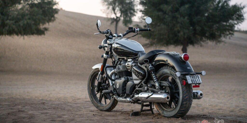 Rear view of the Royal Enfield Super Meteor 650 cruiser motorcycle showcasing its wide rear tyre and classic tail lamp design